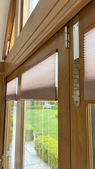 Pleated blinds fitted to corner glazing