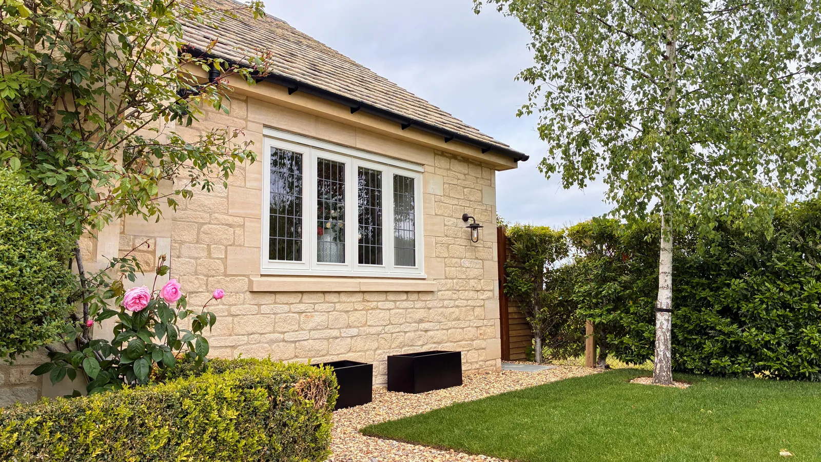 Charnwood House — Cotswold stone side extension