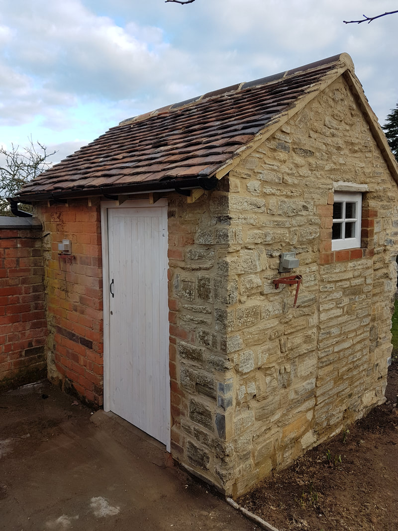 Outbuilding, Church Lench — completed garden store, side view